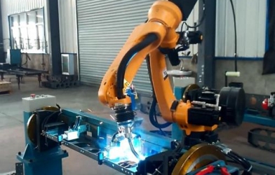 Integrated stamping application of six axis welding robot